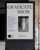 An outdoor sign for an art school's graduate show