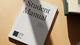 A printed Student Manual for Kolding School of Design on a wooden table