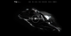 Close-up of a glossy black frog sculpture on a dark background, with the text "frog Source" overlayed in the center.