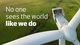 A photo of a windmill from above with the text "No one sees the world like we do" written in white