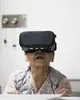 An old woman wearing a VR headset