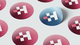 Stickers with blue and red gradients, with the Hunter logo