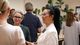 Video cycling through photos of people engaging from office events