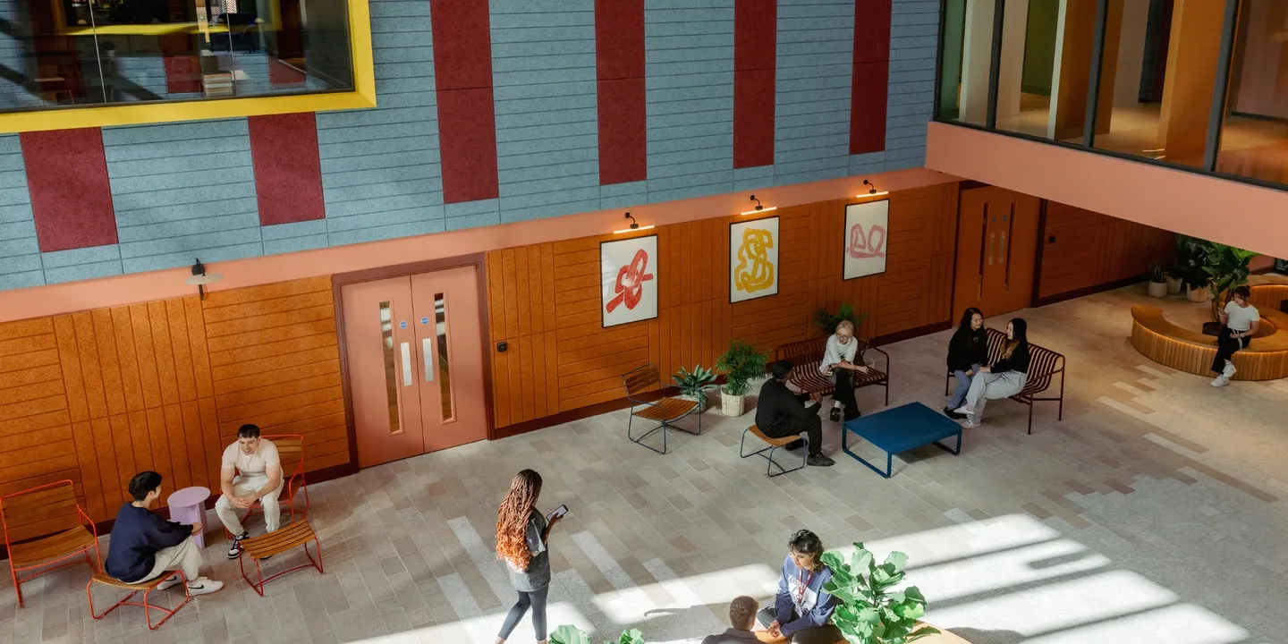 students in scape leeds atrium