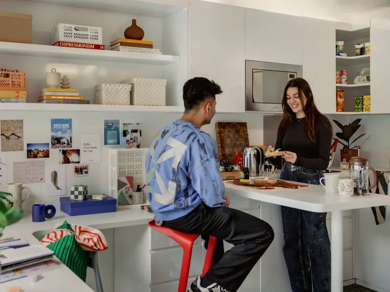 Residents in scape kitchenette