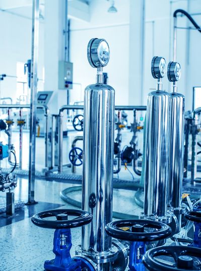 Shows boilers in a chemical plant