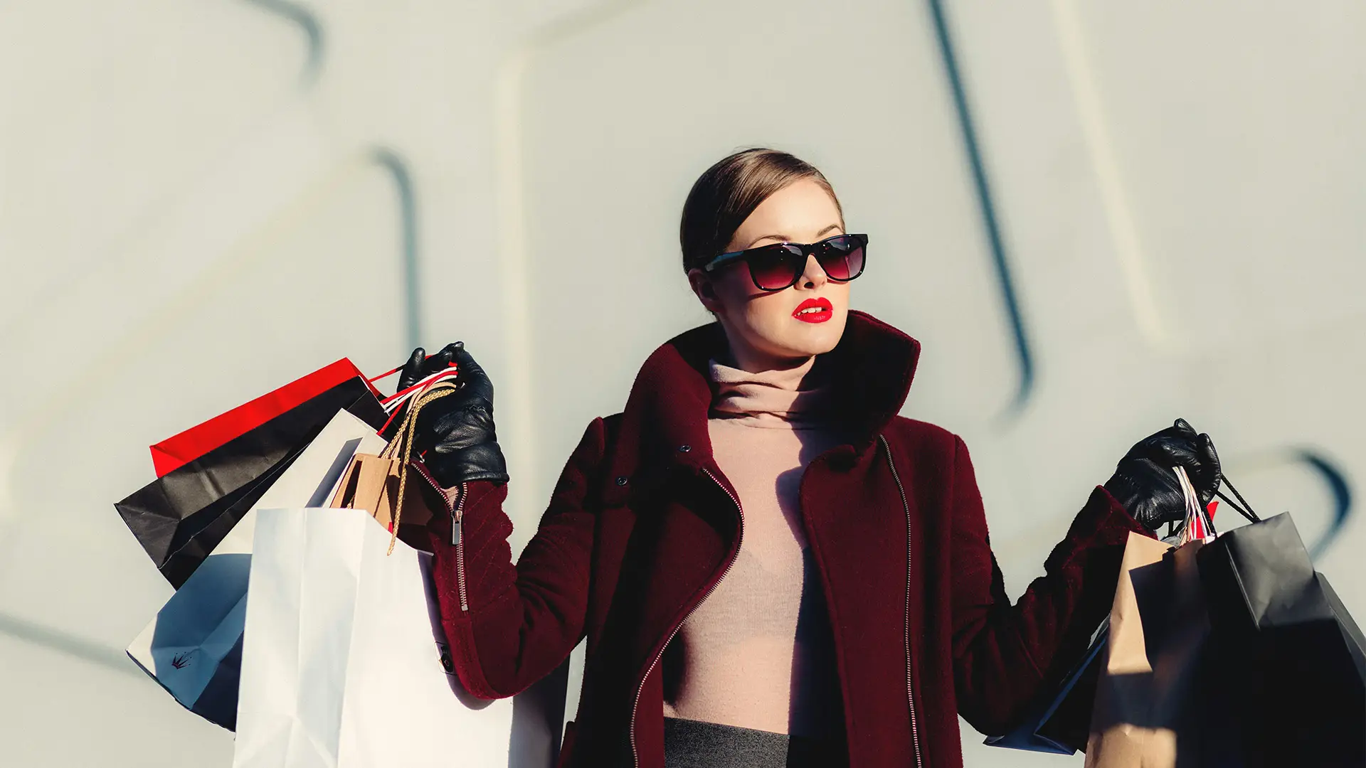 A Woman holding lots of shopping bags