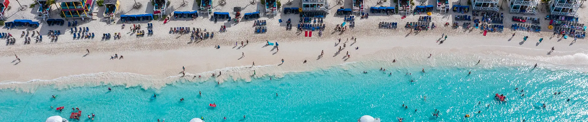 An Aerial top down view of a beach on Half Moon Cay