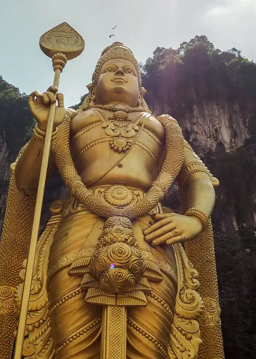 A Tall gold statue in Kuala Lumpur