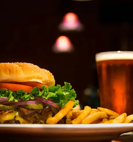 A Burger and Chips offered by a Pub
