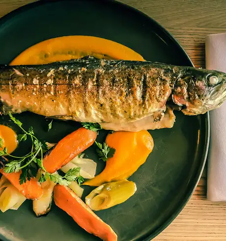 A plate with fish and vegetables