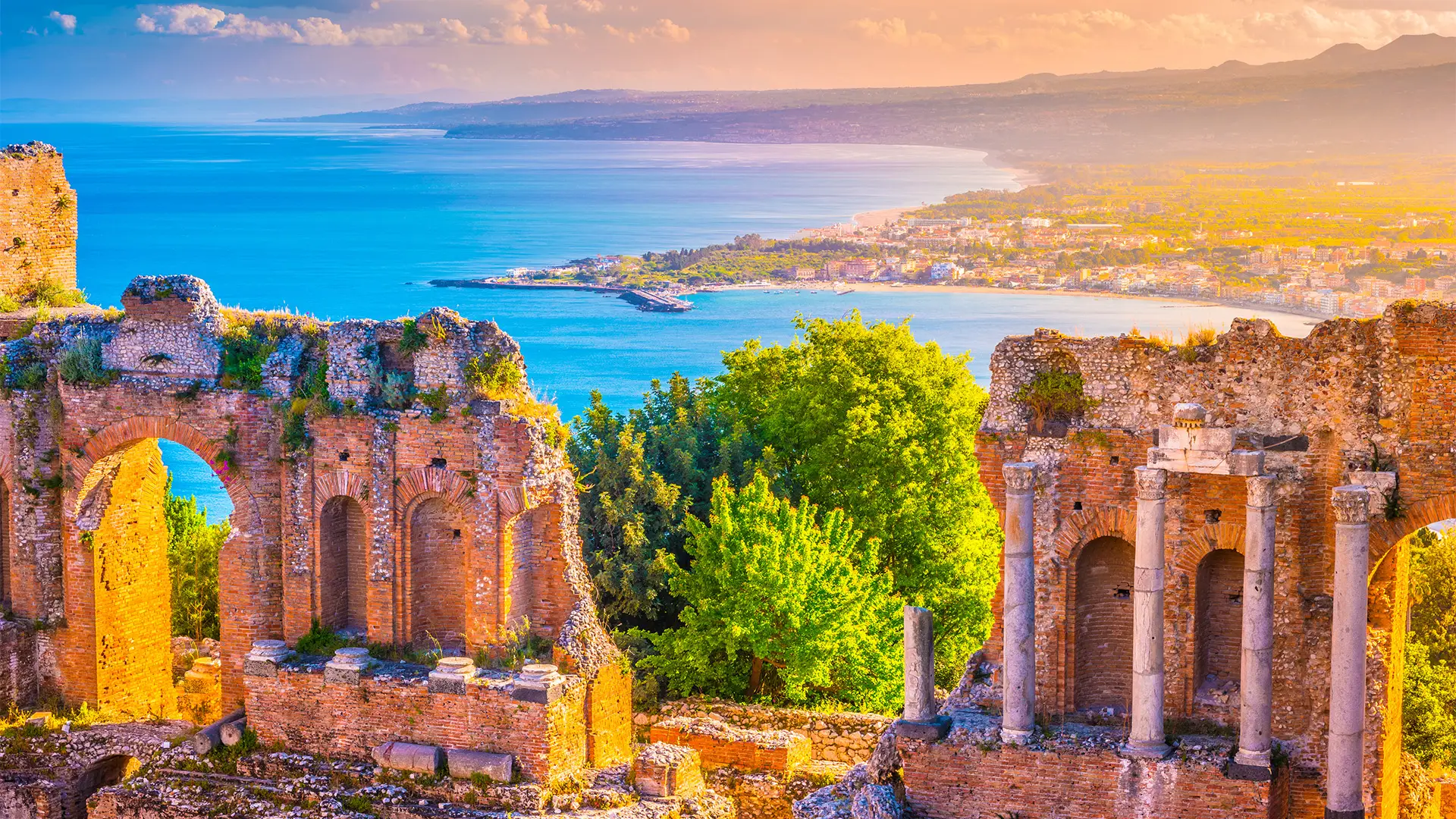 A View of Ruins overlooking the coast of Taormina