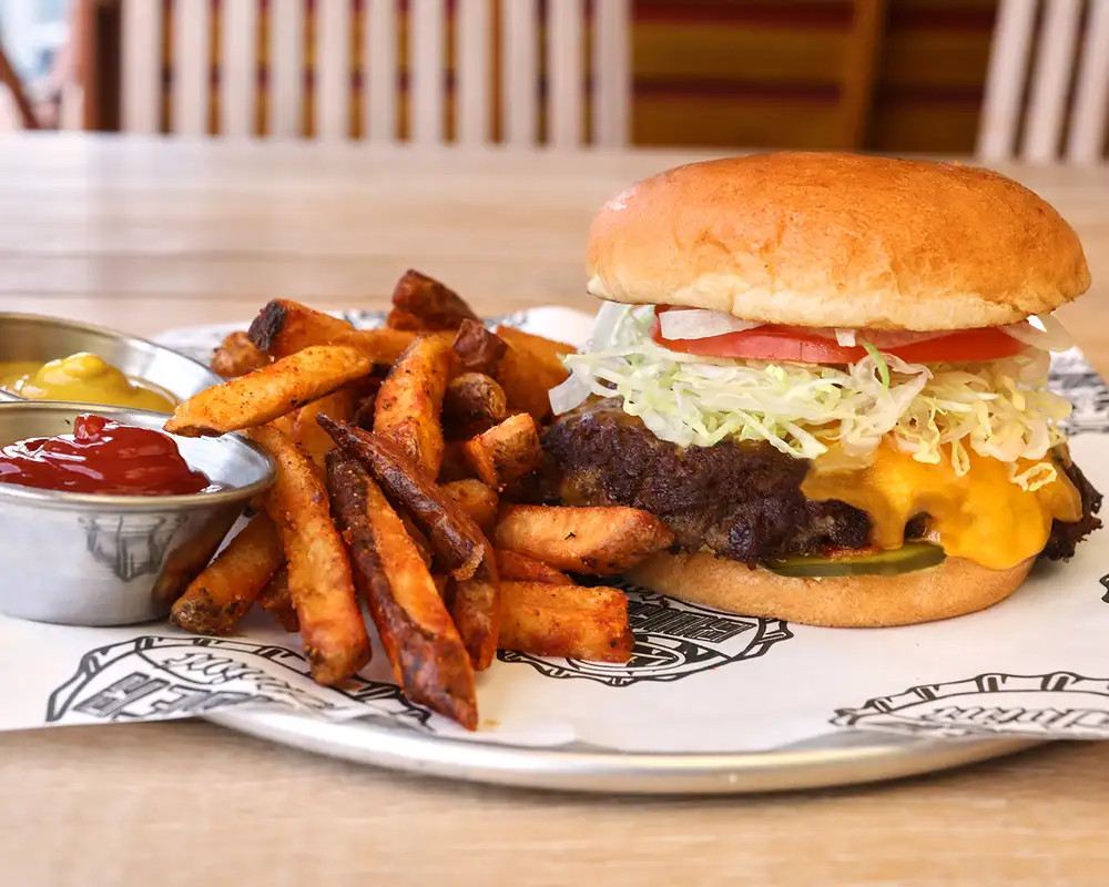 A burger served at Guy's Burger in Carnival Ships