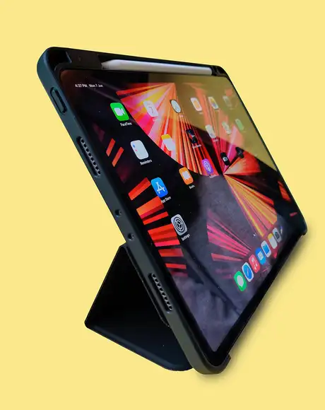 A Tablet on a Yellow Background