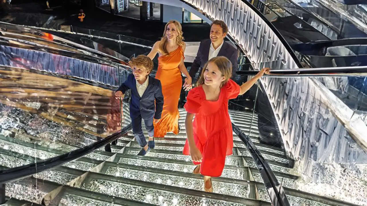 A family walking up stairs on an MSC ship