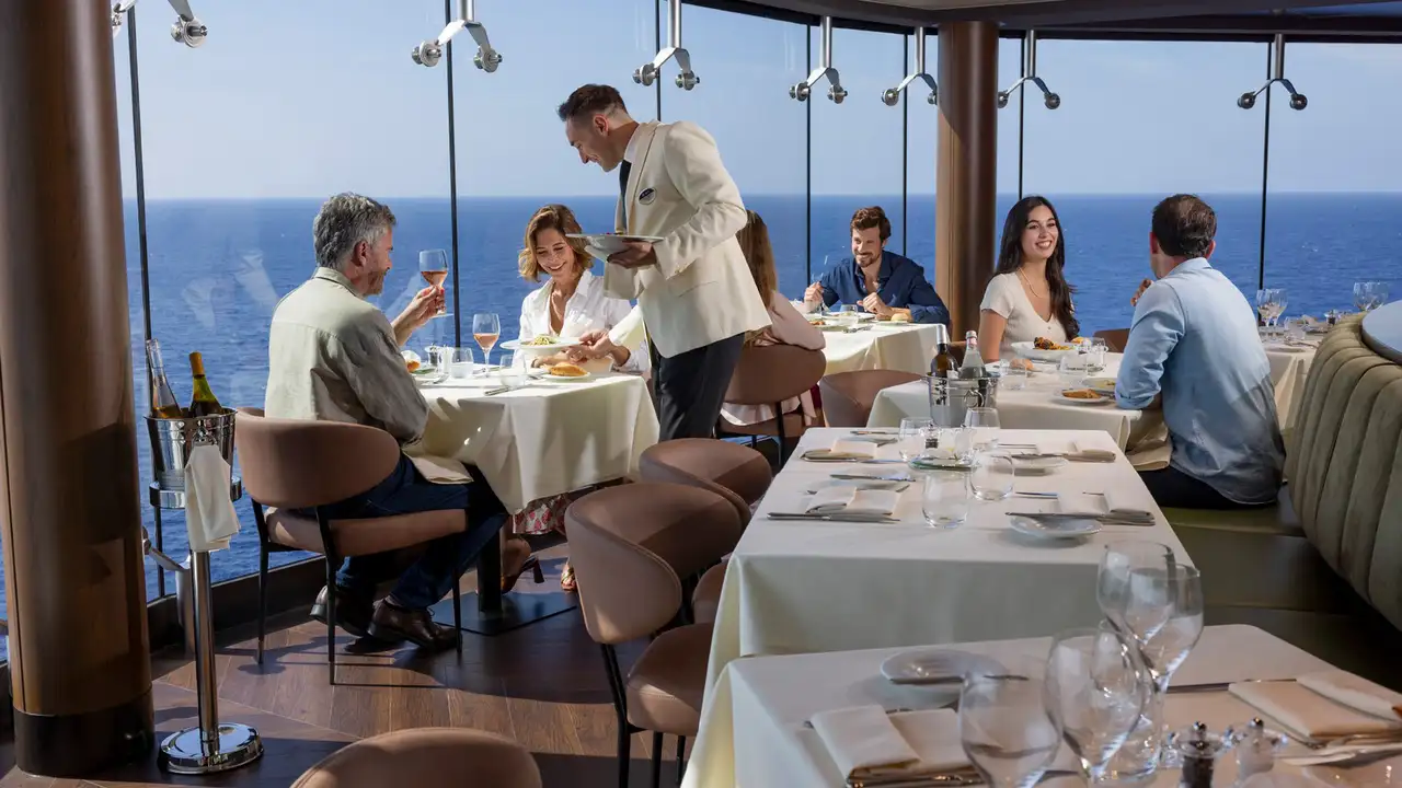 People dining in a restaurant onboard an MSC ship