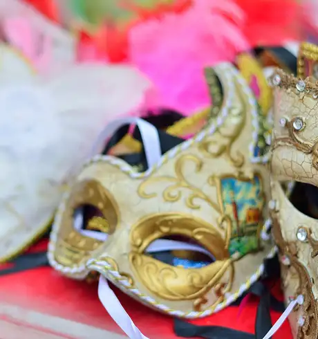 A table full of Carnival masks