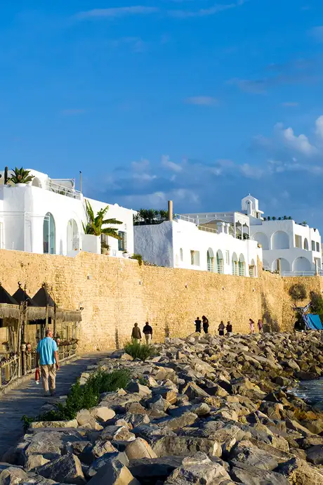 A View of a Waterfront path and surrounding buildings in Hammamet, Tunisia