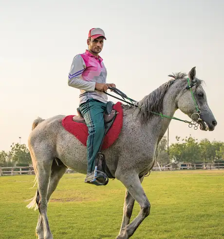 A man riding a horse