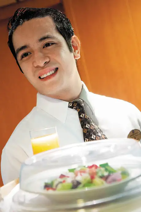 Room service being delivered on an NCL Ship