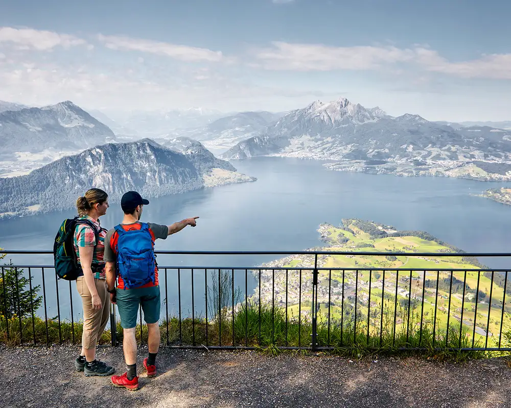 A Couple looking out over a fjord