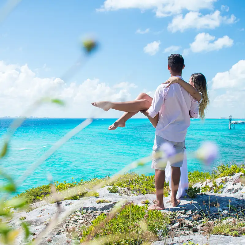 A couple looking out over the ocean