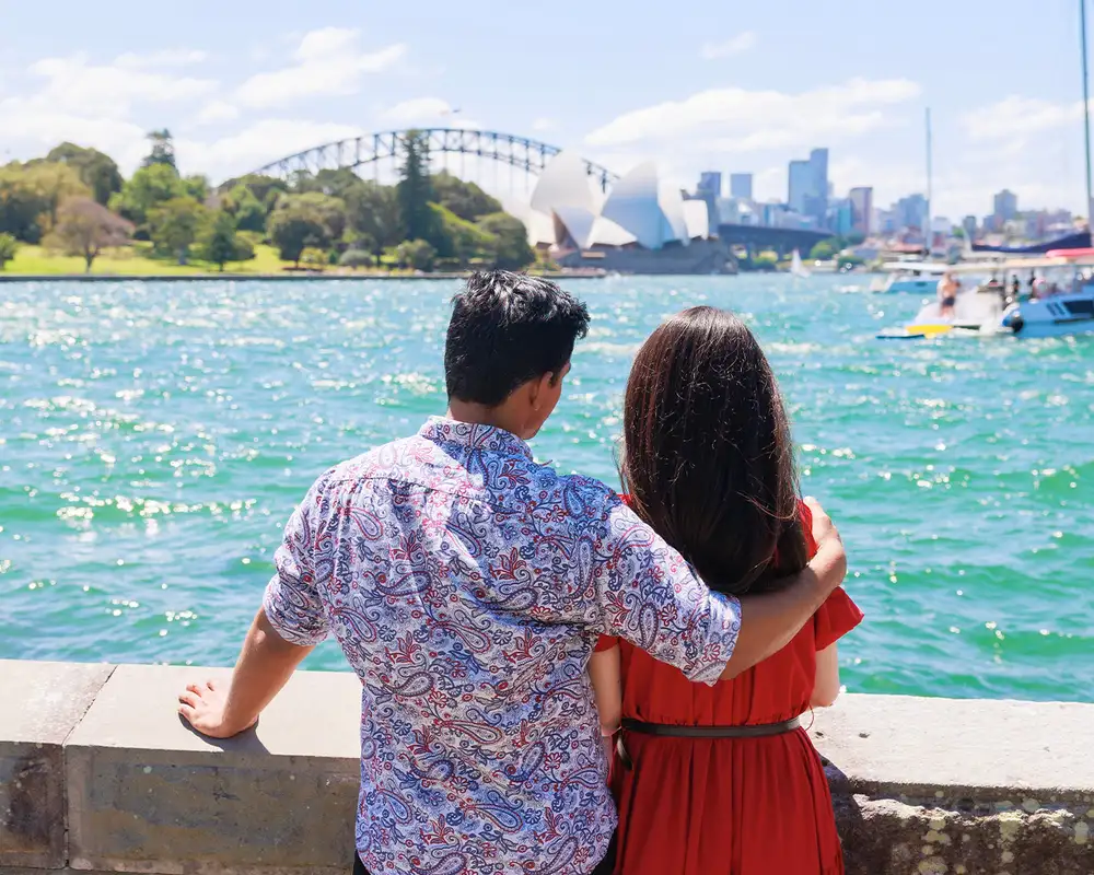 A couple looking out at Sydney Harbour