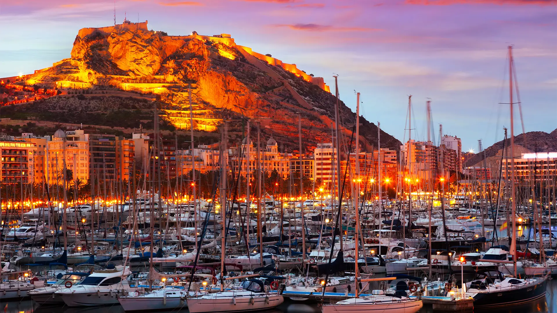 A view of the docks of Alicante during the evening