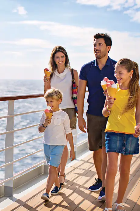 A family walking down the deck, enjoying ice cream on a Costa Cruise Ship
