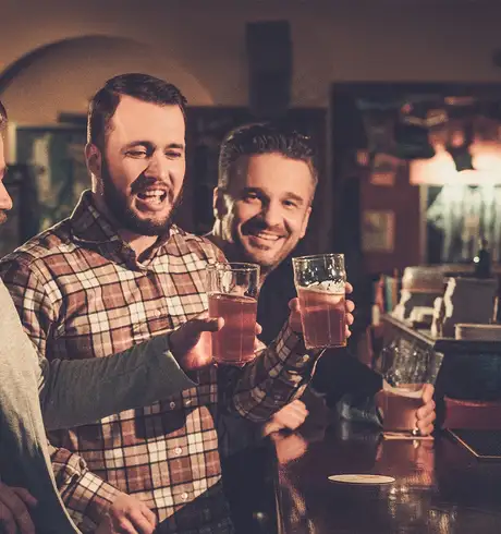 Men drinking in a pub