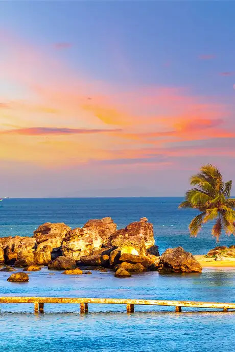 A beach at sunset in Barbados