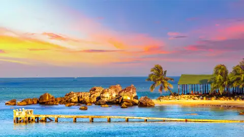 A beach at sunset in Barbados
