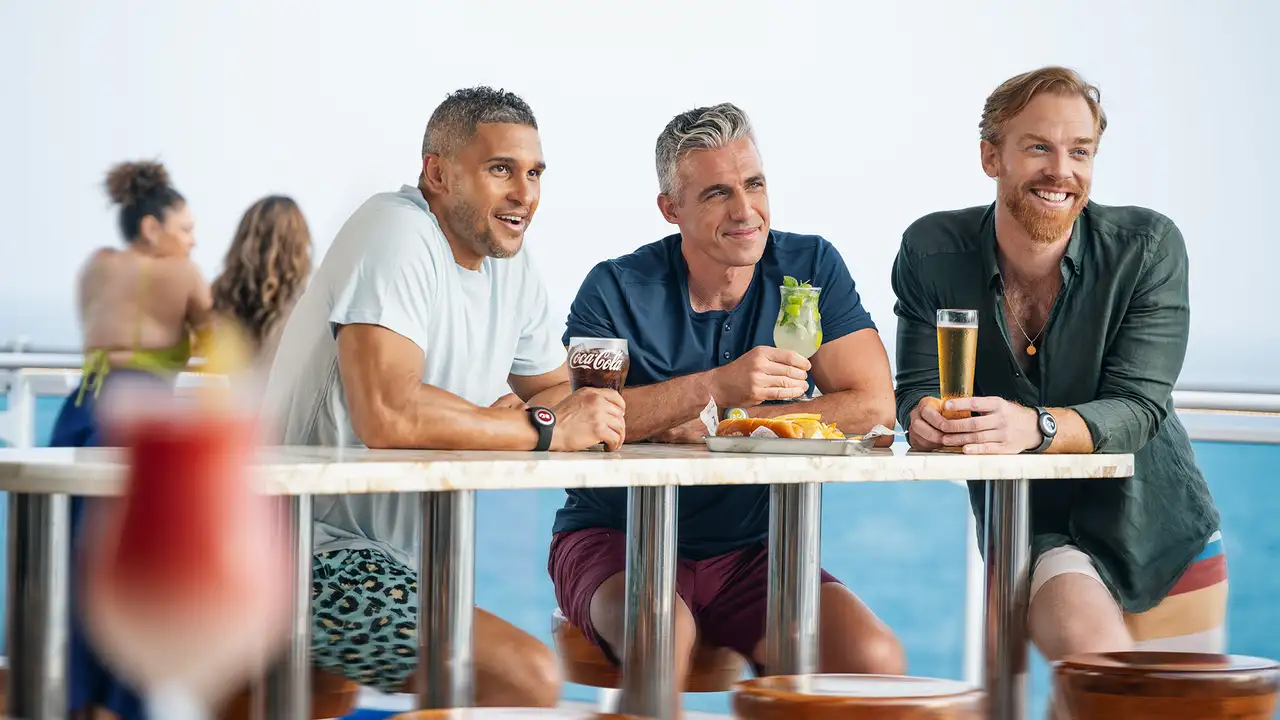 A group of Friends enjoying drinks aboard a Princess Cruise Ship