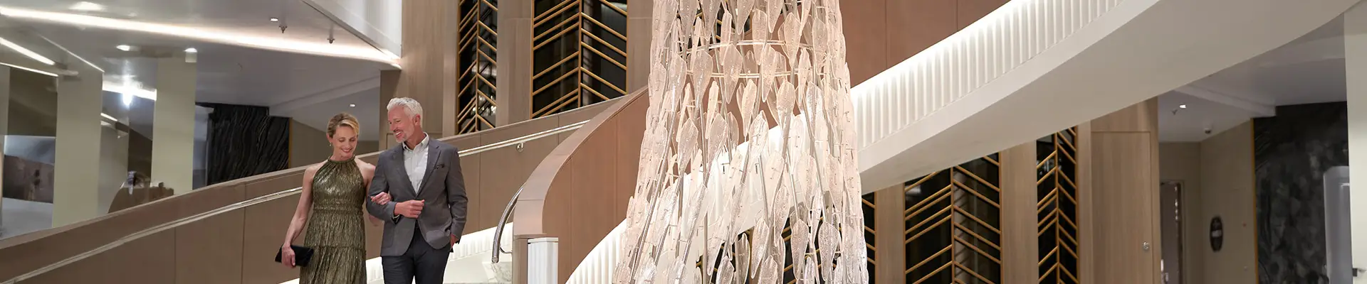 A View of a couple walking down a grand staircase