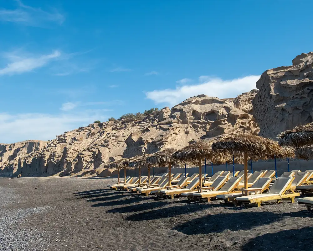 The black sands of Santorini
