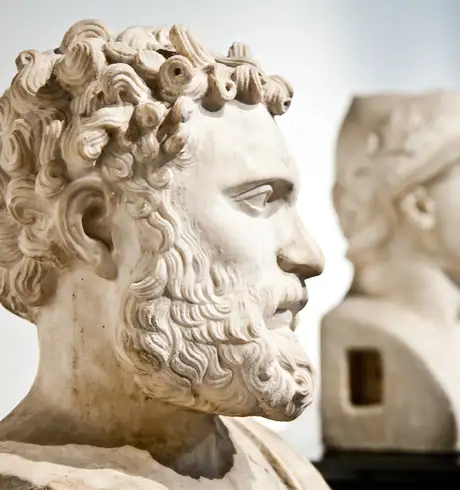 Multiple Statue Busts in a Museum