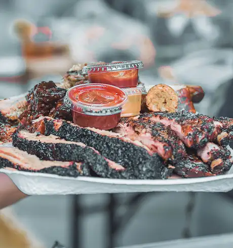 A massive plate of pork and sauce