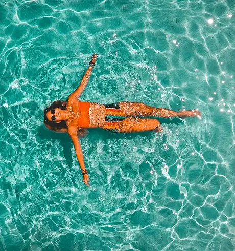 A woman swimming in a pool