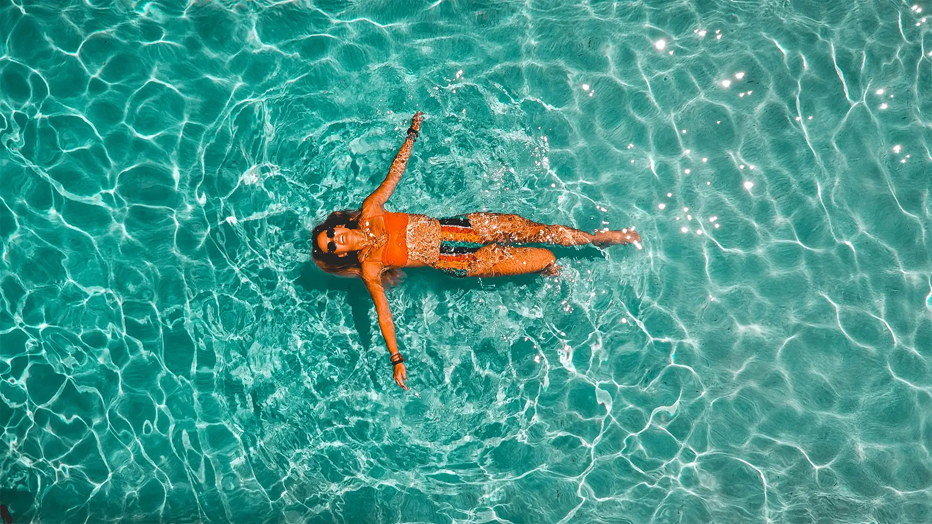 A woman swimming in a pool
