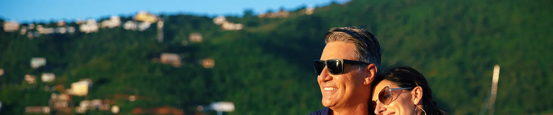 A Couple relaxing aboard an Azamara Ship looking out over the ocean