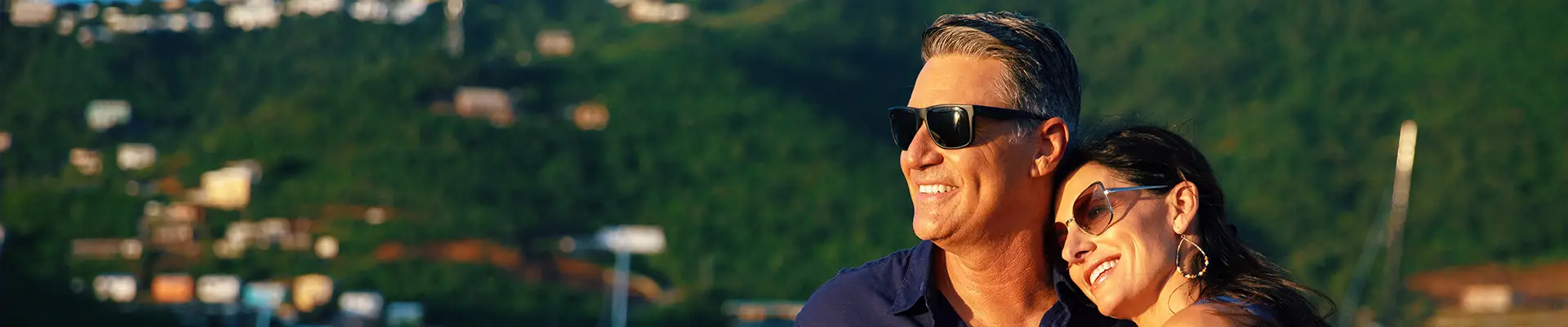 A Couple relaxing aboard an Azamara Ship looking out over the ocean