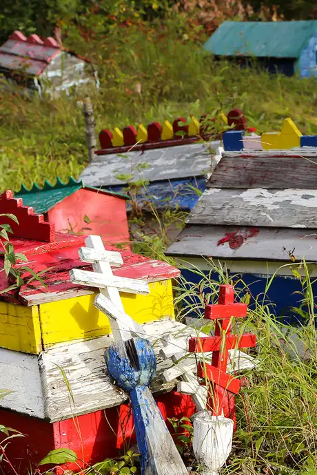 A group of colourful Burial Spirit Houses in Alaska