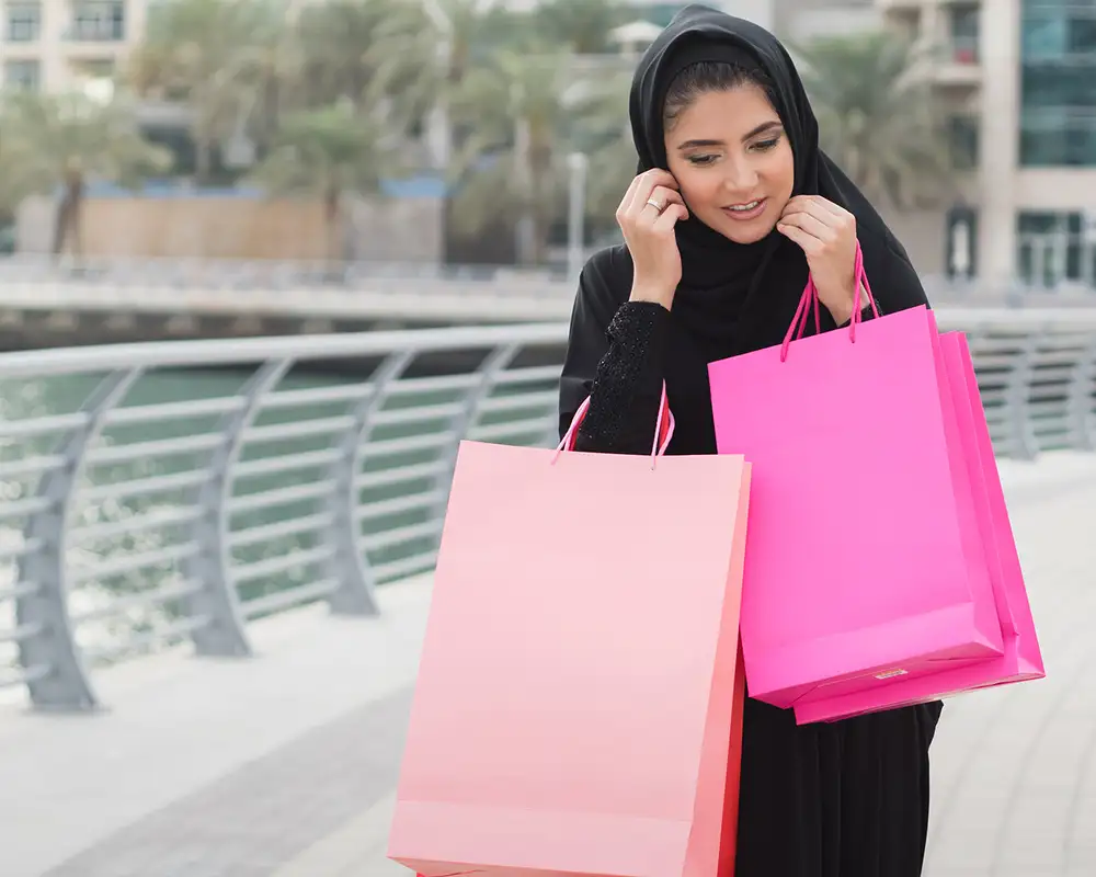 A woman with shopping bags