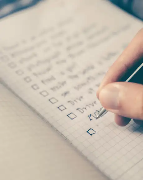 A Person writing a Todo List