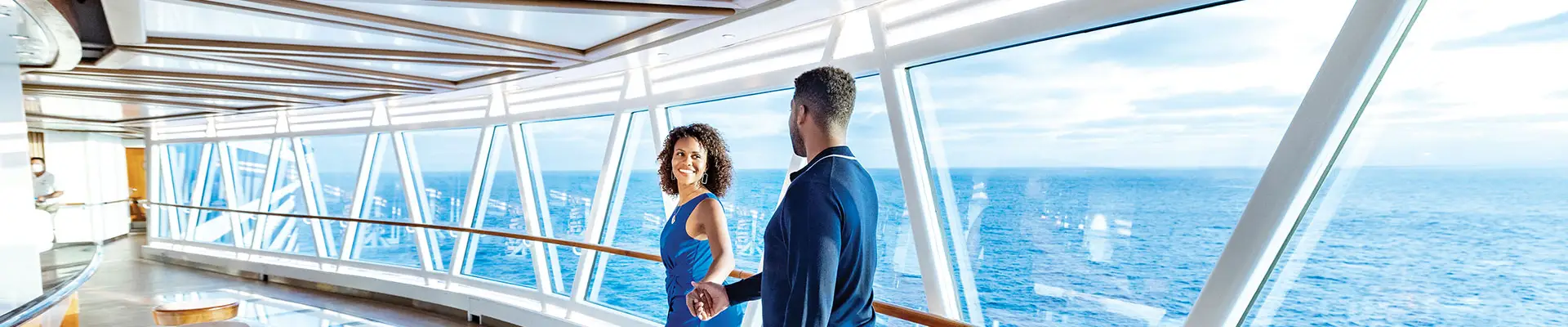 A Couple walking through a SkyWalk present on Princess Ships