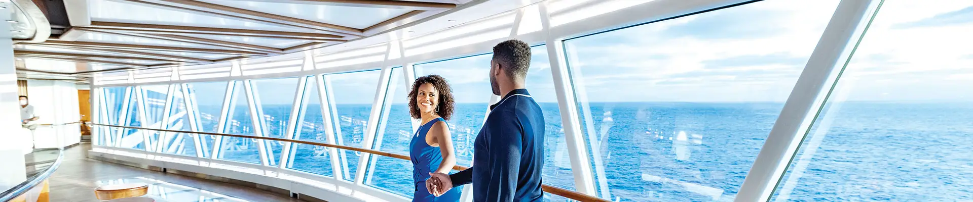 A Couple walking through a SkyWalk present on Princess Ships