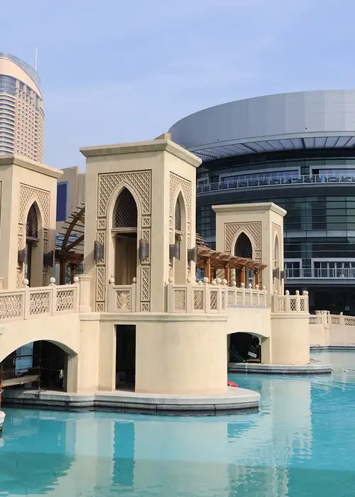 A building in Dubai next to a river