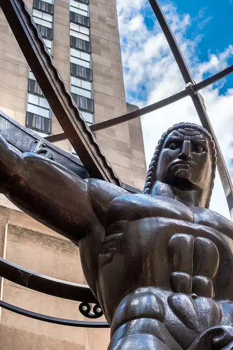 A statue of Atlas carrying the globe in Rockerfeller Center in New York