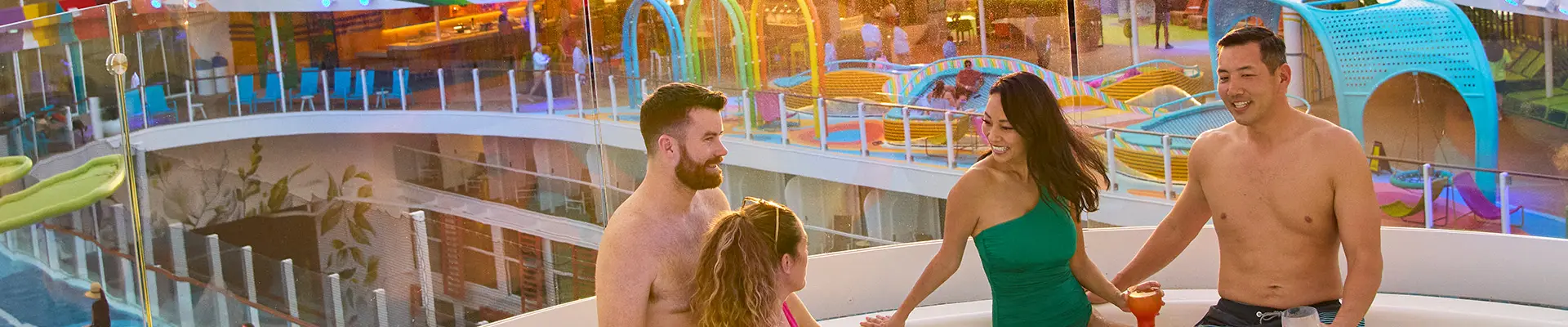 A group of friends relaxing in a hot tub aboard a Royal Caribbean ship