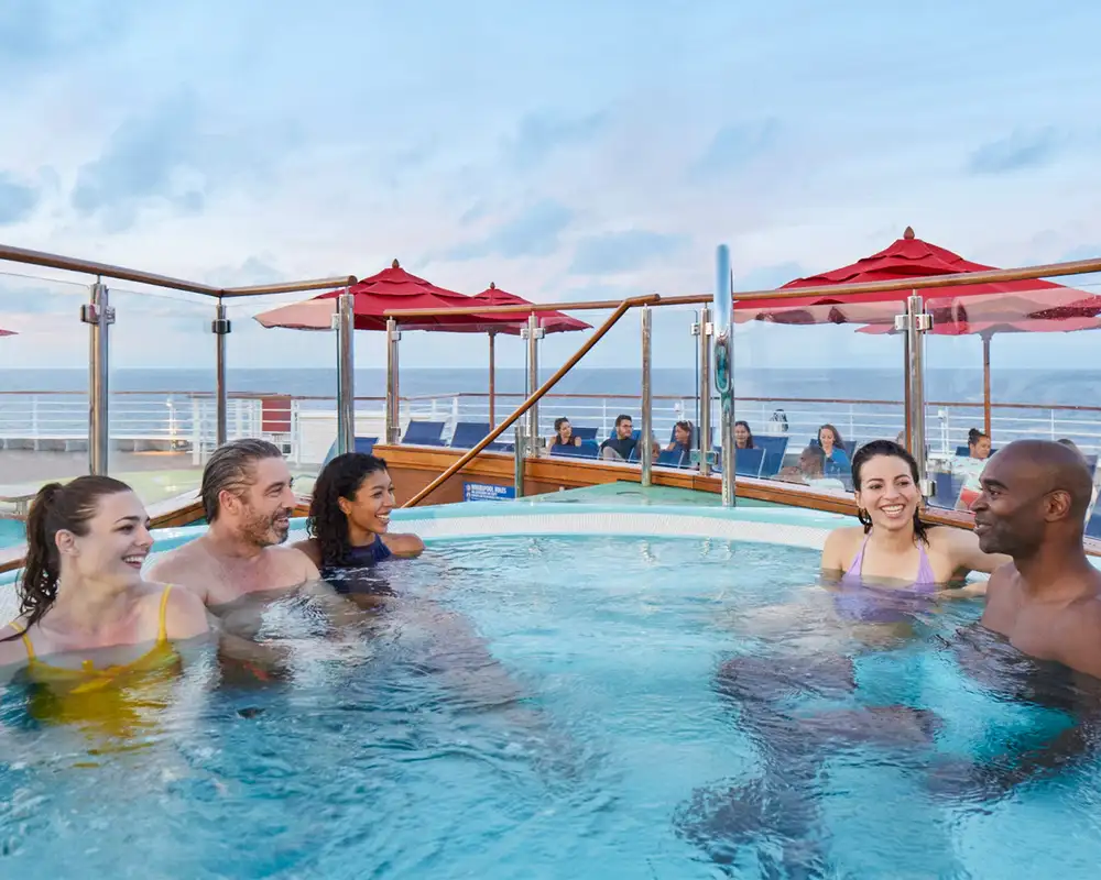 A group of people in a hot tub aboard a Carnival Cruise Ship